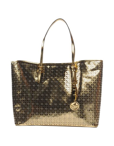 michael kors gold bag gift with purchase|Michael Kors gold evening bag.